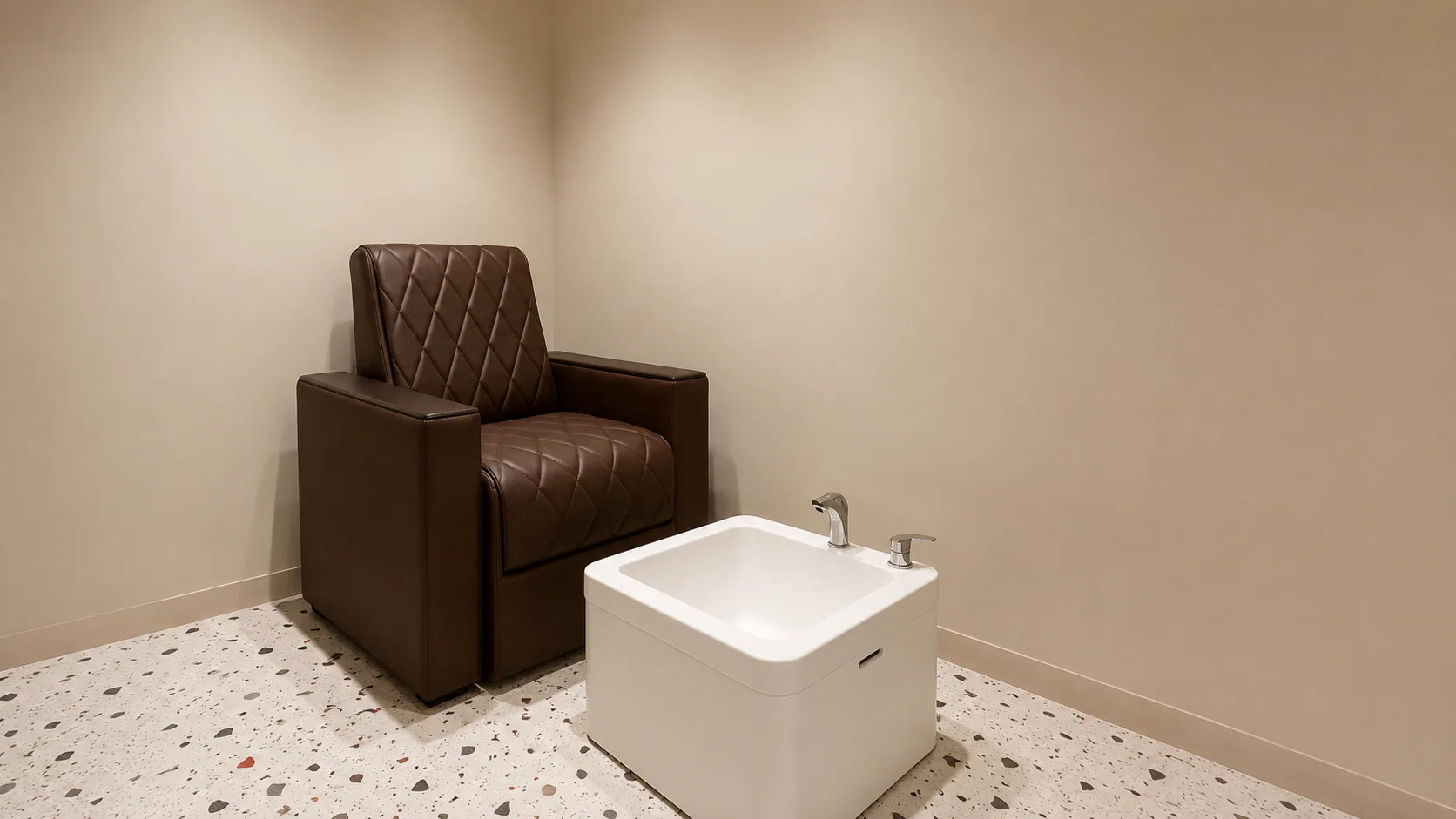 Pedicure chair and basin in a compact Toni & Guy treatment area.