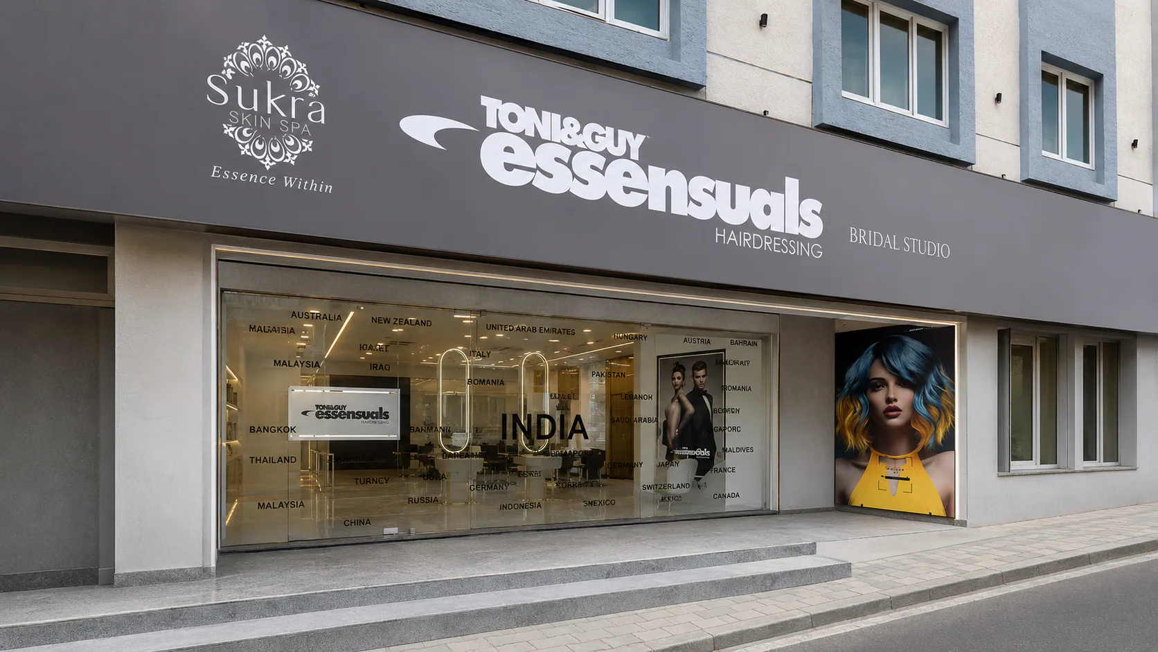 Street-facing Toni & Guy and Sukra storefront in Virugambakkam.